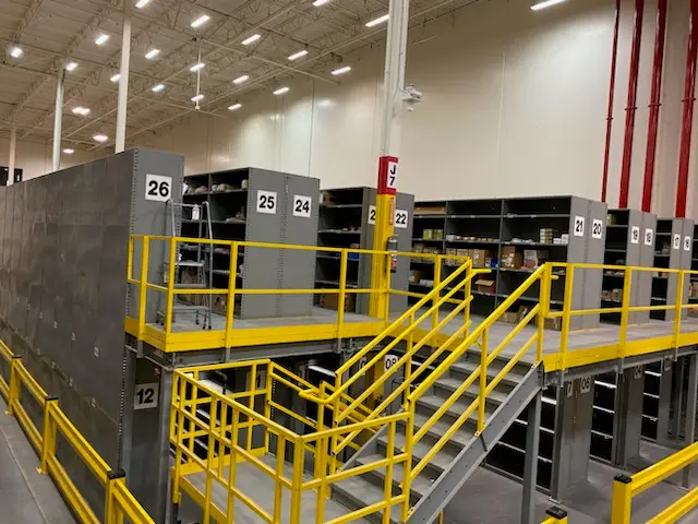 Overview of gently used mezzanine system available for sale, featuring extensive storage capacity image 1